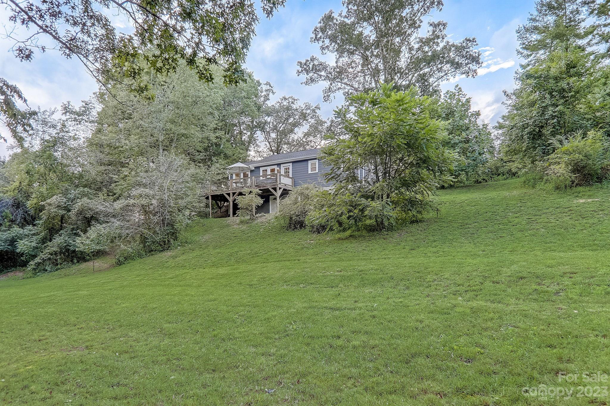 290 Upper Brush Creek Road Fletcher, NC 28732 - Photo 35 of 48 a view of a backyard
