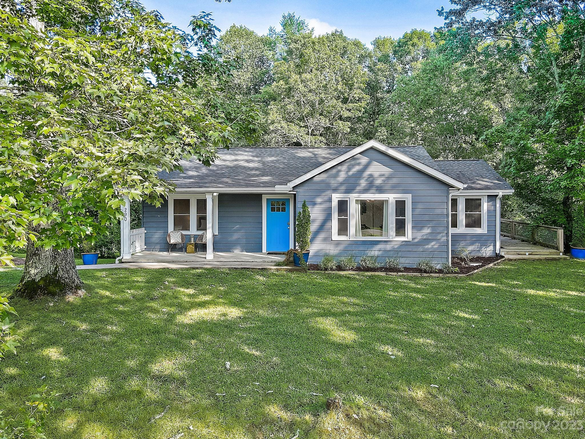 290 Upper Brush Creek Road Fletcher, NC 28732 - Photo 47 of 48 a front view of a house with a garden