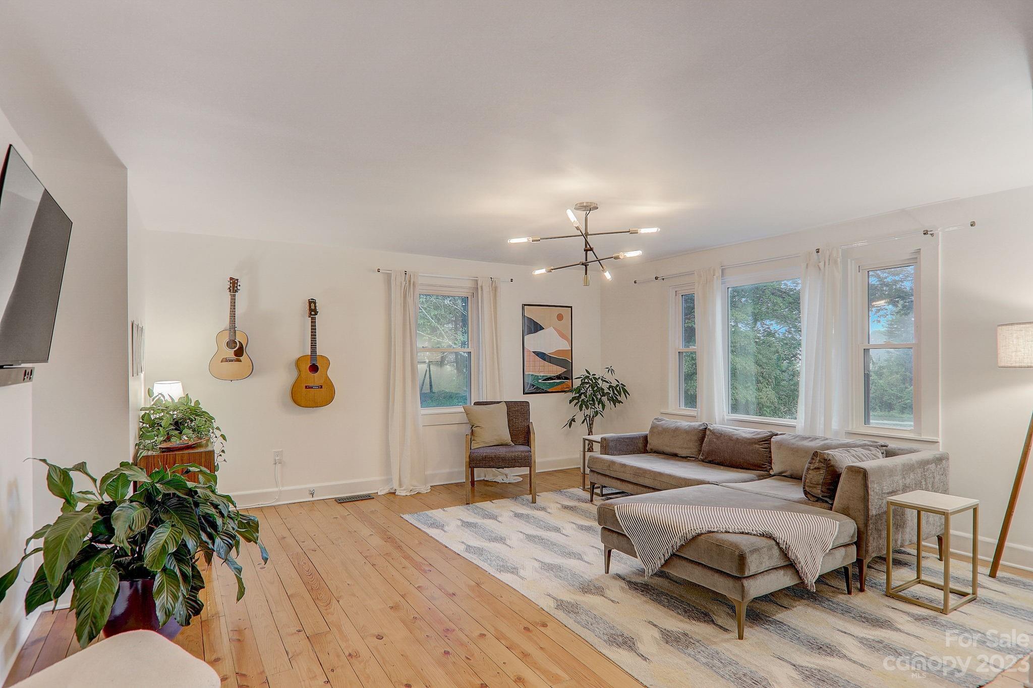 290 Upper Brush Creek Road Fletcher, NC 28732 - Photo 7 of 48 a living room with furniture and a large window