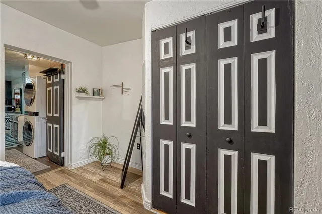 a view of entryway with wooden floor and stairs