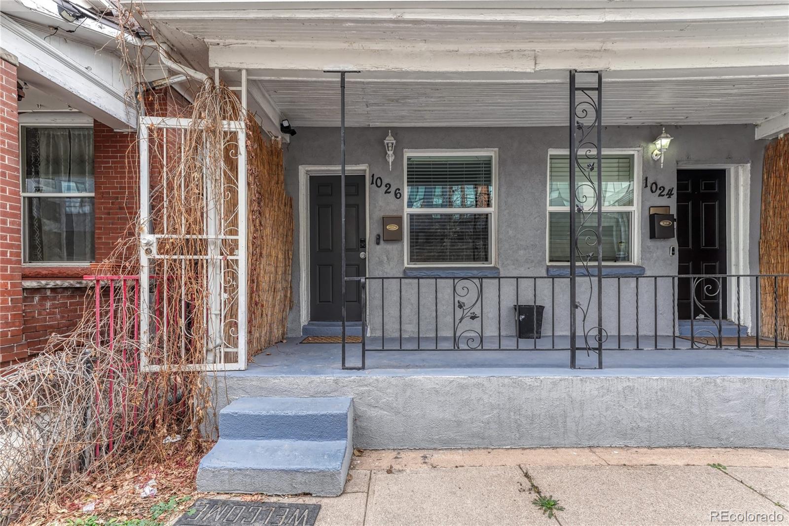 1026 Inca Street Denver, CO 80204 - Photo 3 of 27 a view of a house with a porch