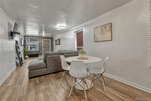 a view of a livingroom with furniture and a couch