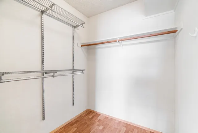 a view of a room with racks on the wall