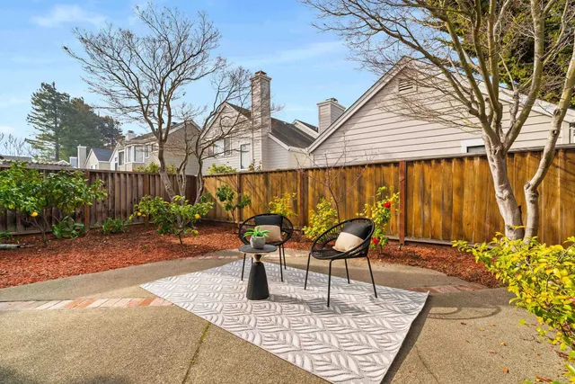 a view of a swimming pool with a backyard