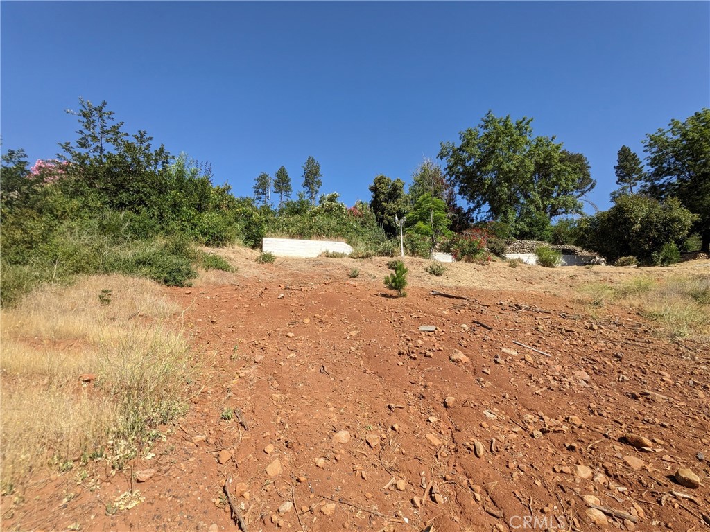 1880 Stearns Road Paradise, CA 95969 - Photo 14 of 32 a view of a dirt road with a building in the background