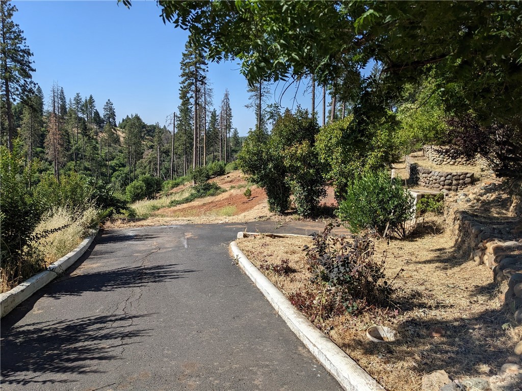1880 Stearns Road Paradise, CA 95969 - Photo 21 of 32 a view of a road with a yard