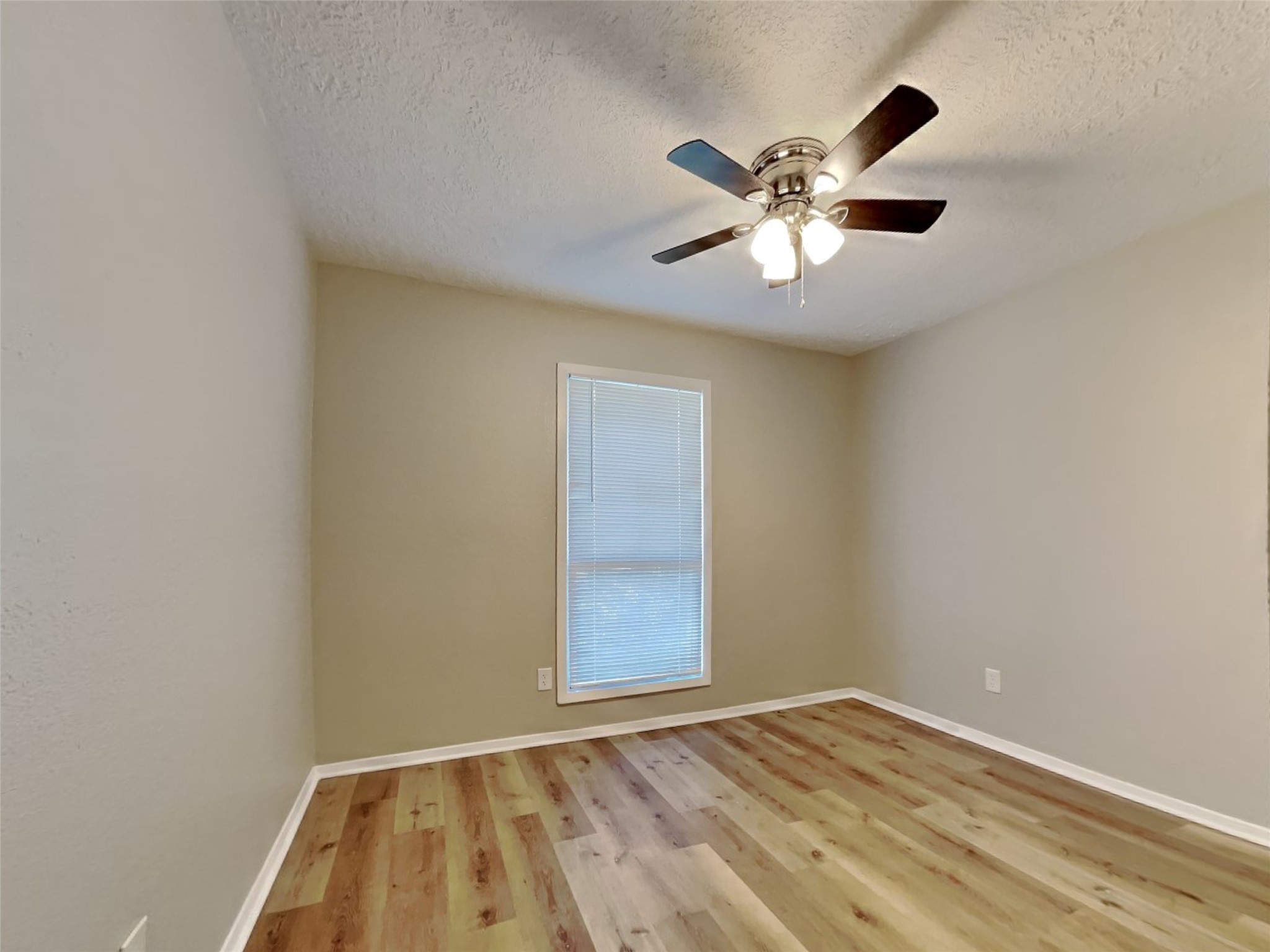 4315 Hirschfield Road Spring, TX 77373 - Photo 13 of 18 a view of room with window and ceiling fan