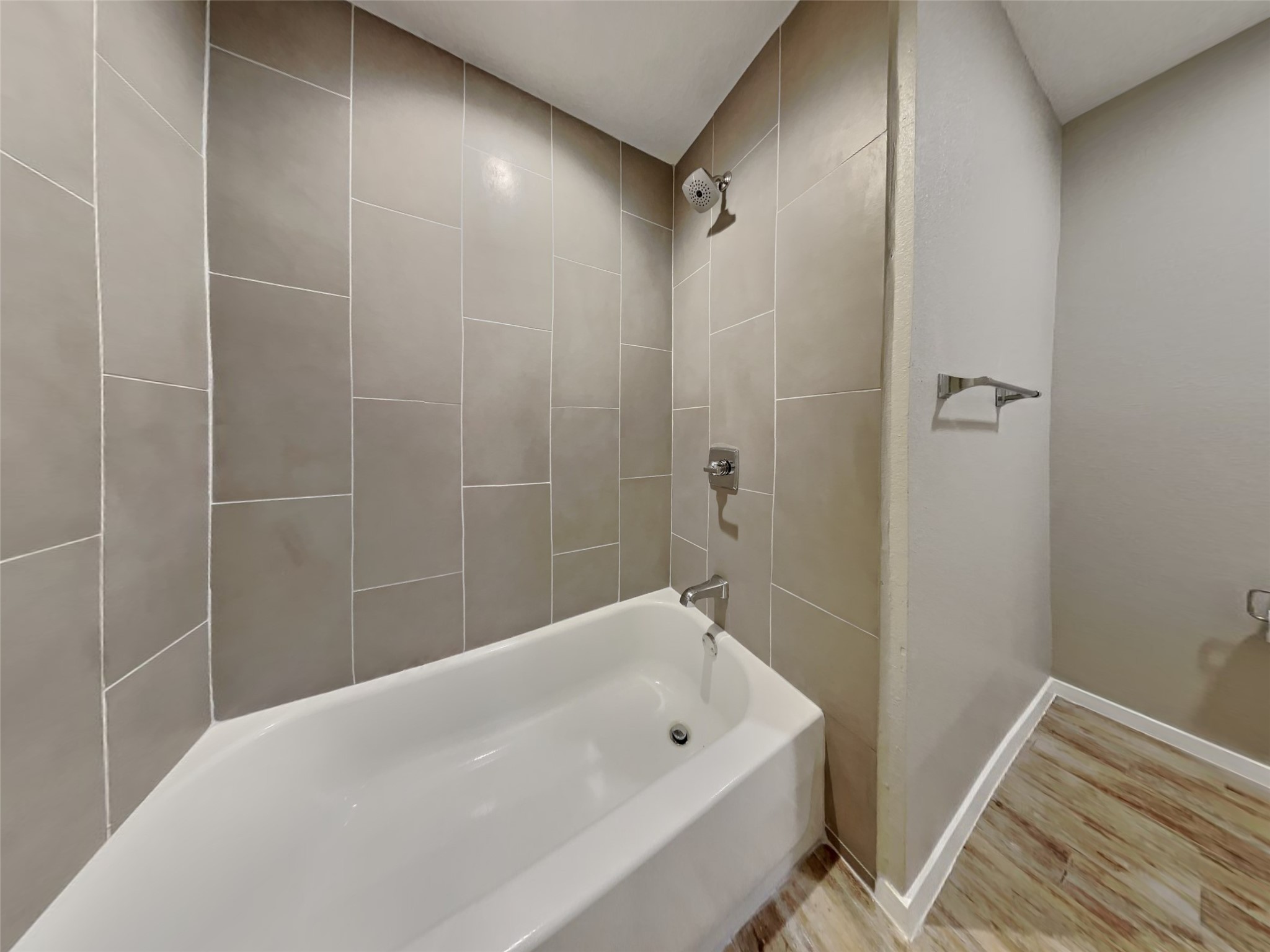 4315 Hirschfield Road Spring, TX 77373 - Photo 16 of 18 a bathroom with a bathtub and shower