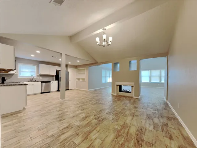 a view of a kitchen with a sink and cabinet area