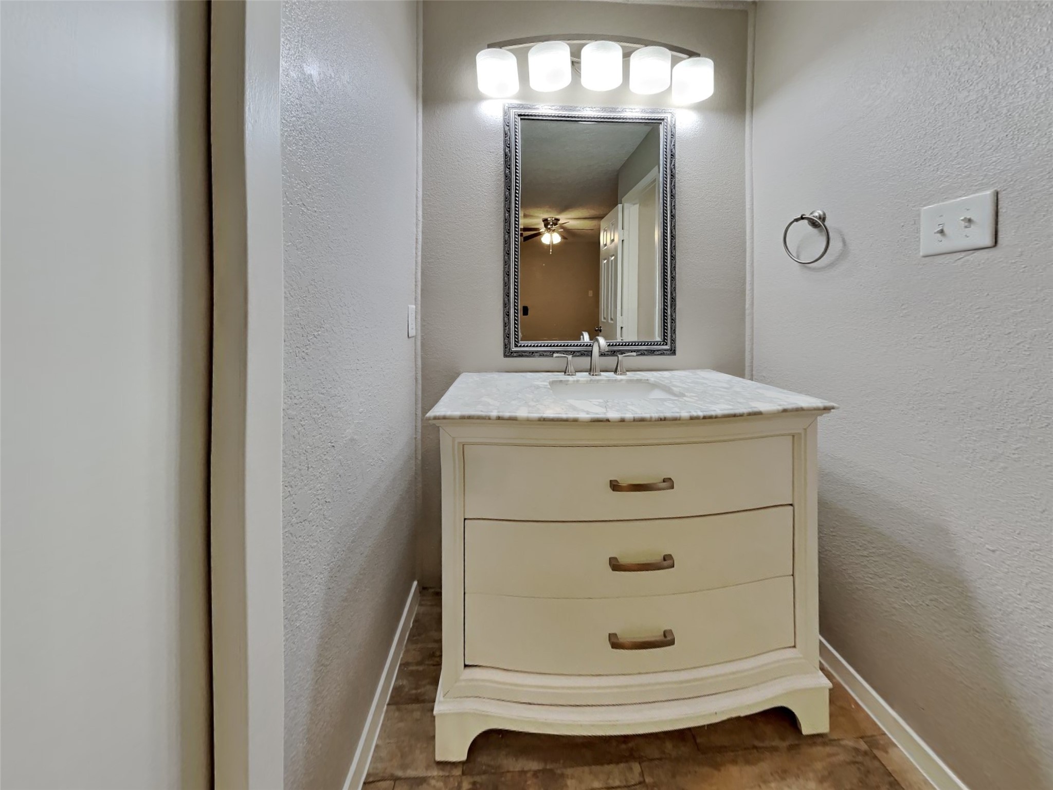 4315 Hirschfield Road Spring, TX 77373 - Photo 10 of 18 a bathroom with a sink and a mirror