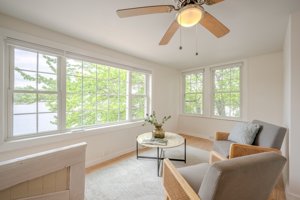 11 Lakeside Road Billerica, MA 01821 - Photo 11 of 38 a living room with furniture and a large window