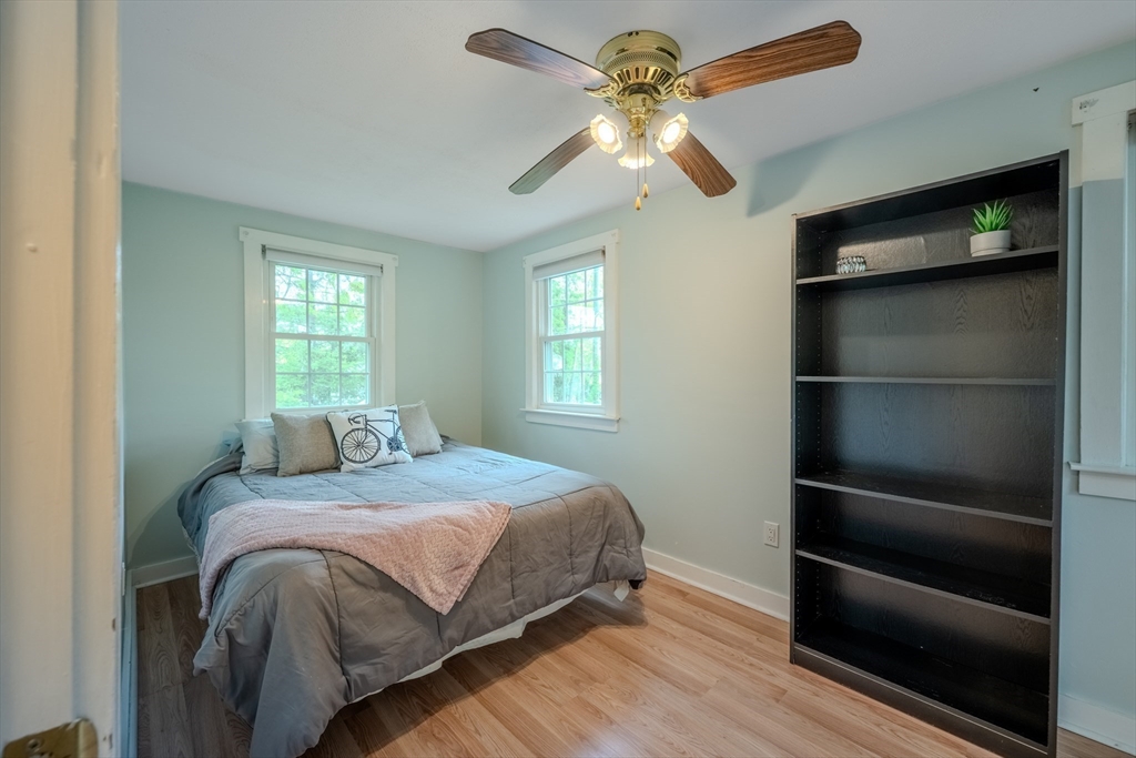 11 Lakeside Road Billerica, MA 01821 - Photo 20 of 38 a bedroom with a bed and a ceiling fan