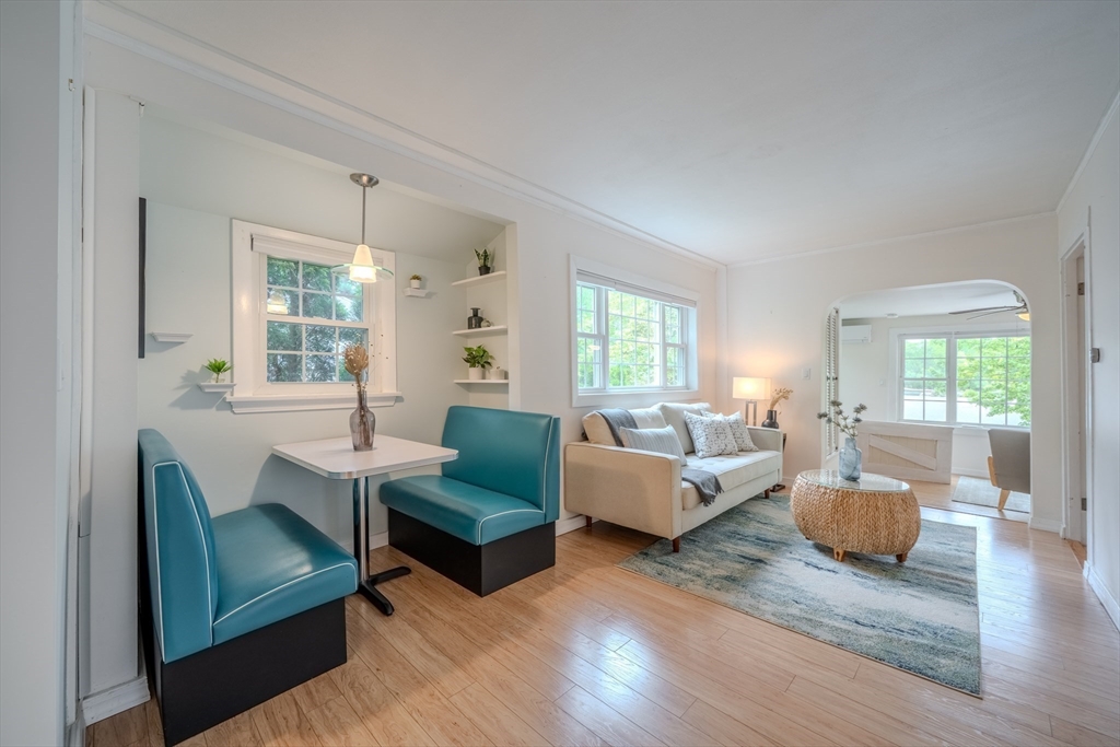 11 Lakeside Road Billerica, MA 01821 - Photo 2 of 38 a living room with furniture and a wooden floor