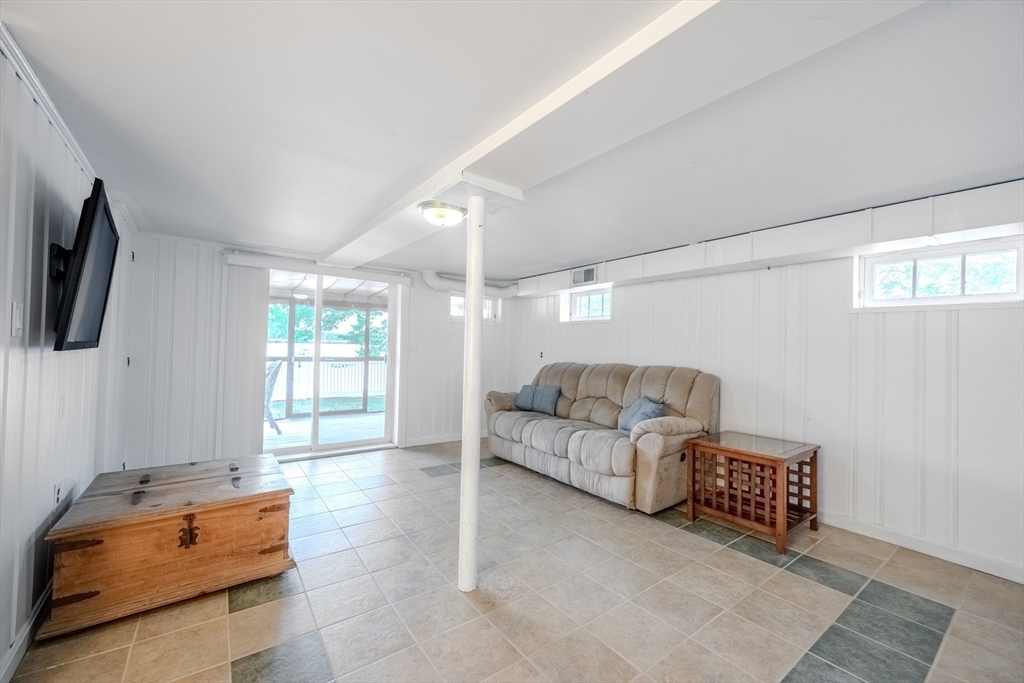 11 Lakeside Road Billerica, MA 01821 - Photo 23 of 38 a living room with furniture and a window