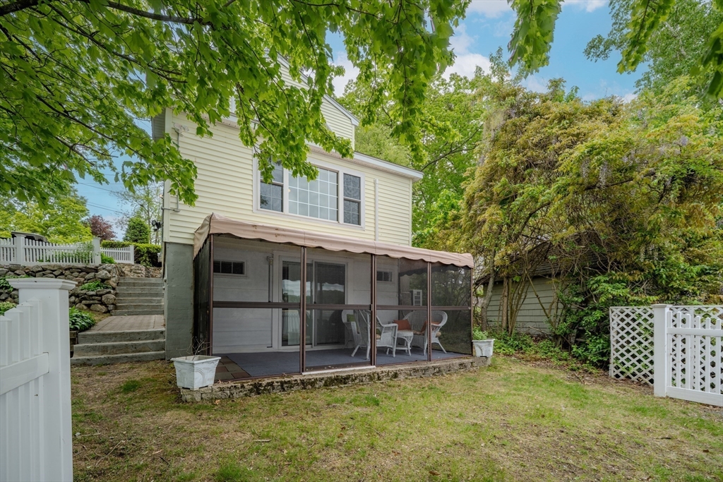 11 Lakeside Road Billerica, MA 01821 - Photo 26 of 38 a view of a house with a yard and sitting area