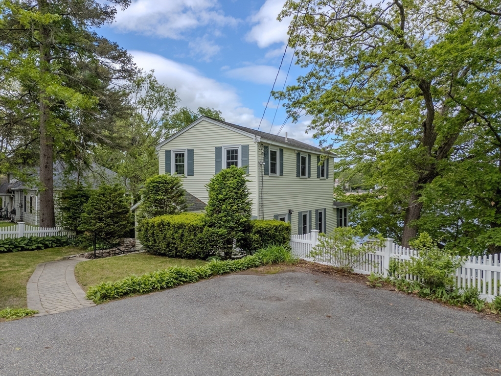 11 Lakeside Road Billerica, MA 01821 - Photo 29 of 38 a front view of a house with a garden