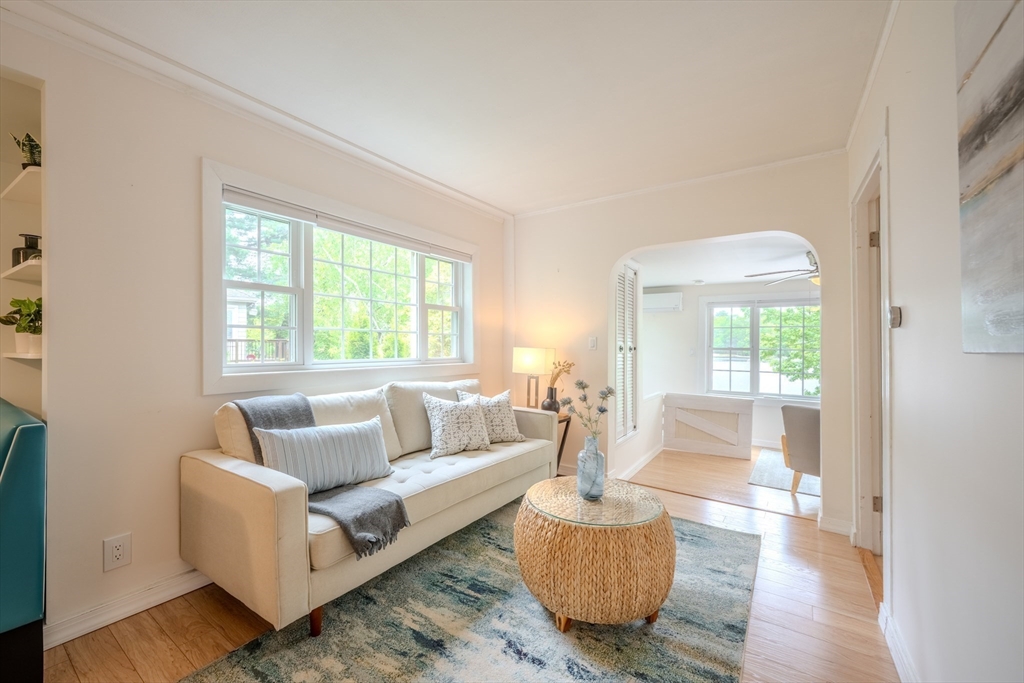 11 Lakeside Road Billerica, MA 01821 - Photo 3 of 38 a living room with furniture and a large window