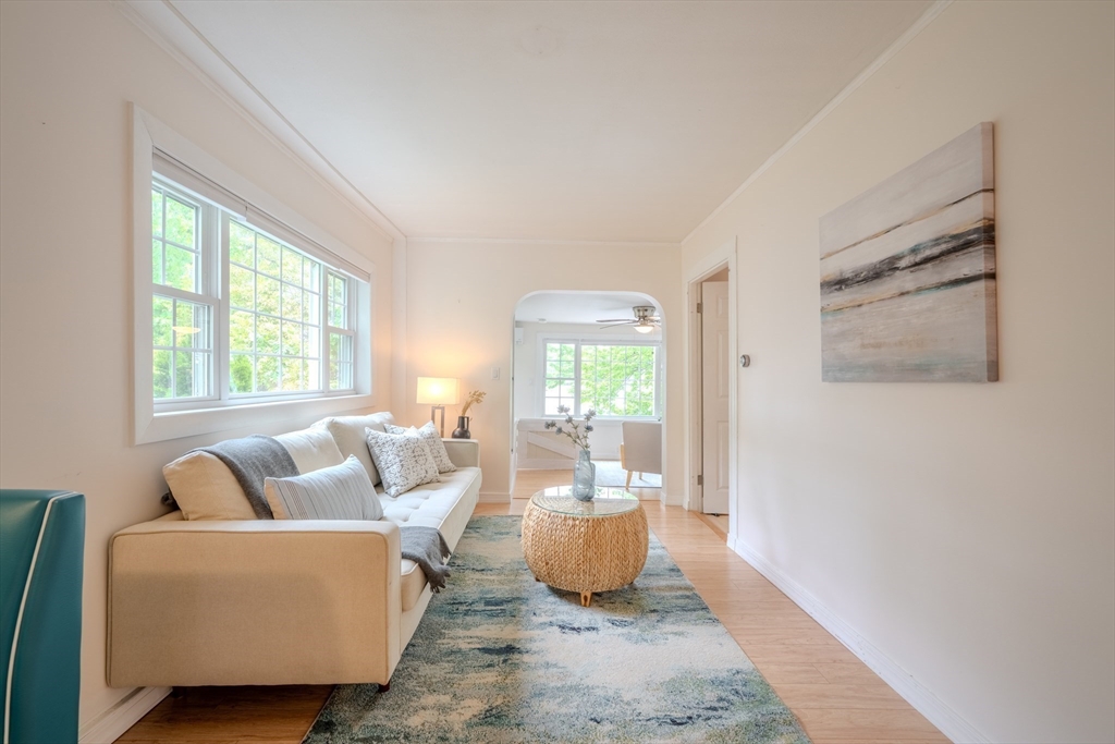 11 Lakeside Road Billerica, MA 01821 - Photo 4 of 38 a living room with furniture and a large window