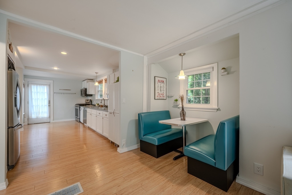 11 Lakeside Road Billerica, MA 01821 - Photo 6 of 38 a living room with furniture a large window and wooden floor