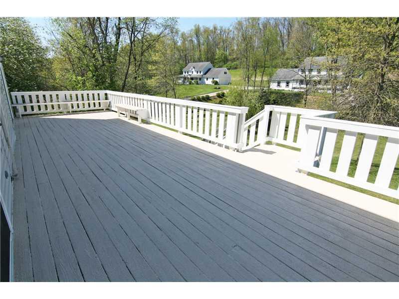 183 Bebout Road Venetia, PA 15367 - Photo 12 of 25 Patio/Deck. Perfect for outdoor dining and parties...A retractable awning provides afternoon shade! Enjoy the view of trees and stream or supervise rear yard play!