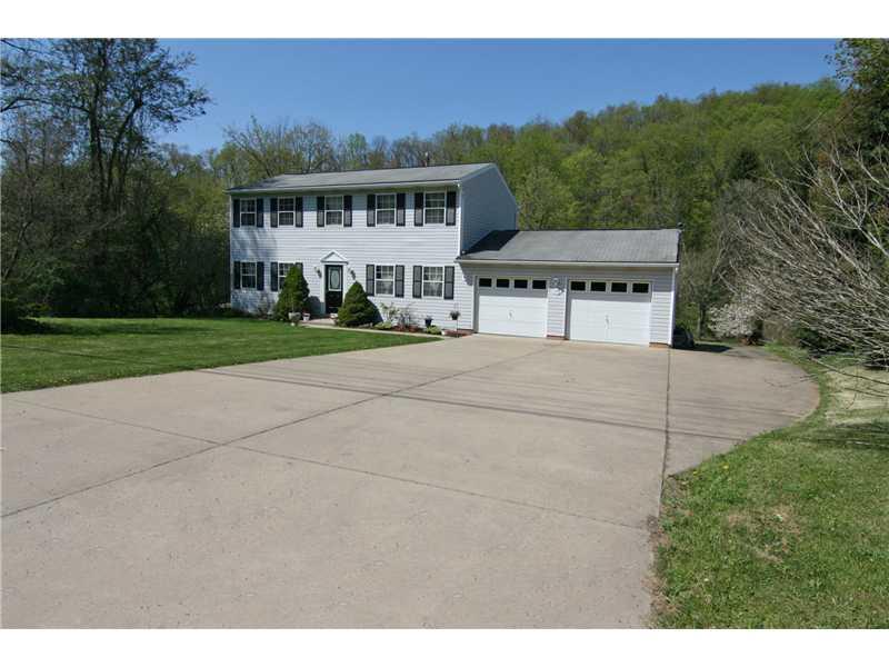 183 Bebout Road Venetia, PA 15367 - Photo 25 of 25 Exterior Front. Extra two-car deep parking pad on right...attached garage makes for easy unloading of groceries!