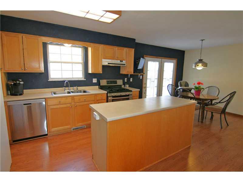 183 Bebout Road Venetia, PA 15367 - Photo 8 of 25 Kitchen. The spacious center-island kitchen provides access doors to the deck for easy outdoor dining and entertaining...