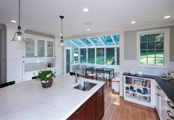 31 Sheffield Road Newton, MA 02460 - Photo 8 of 16 a kitchen with stainless steel appliances granite countertop sink stove and wooden floor