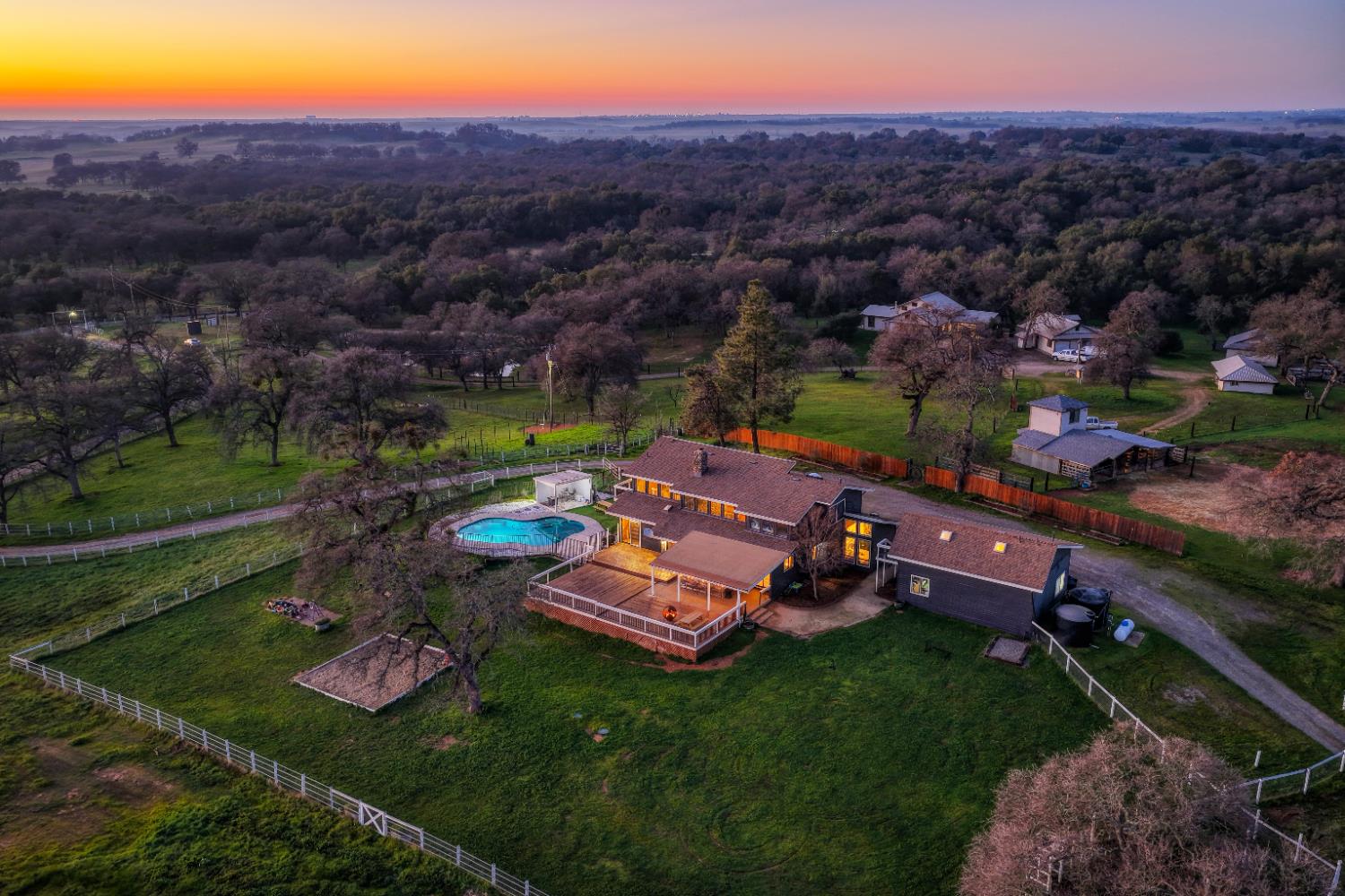 an aerial view of a house with a garden