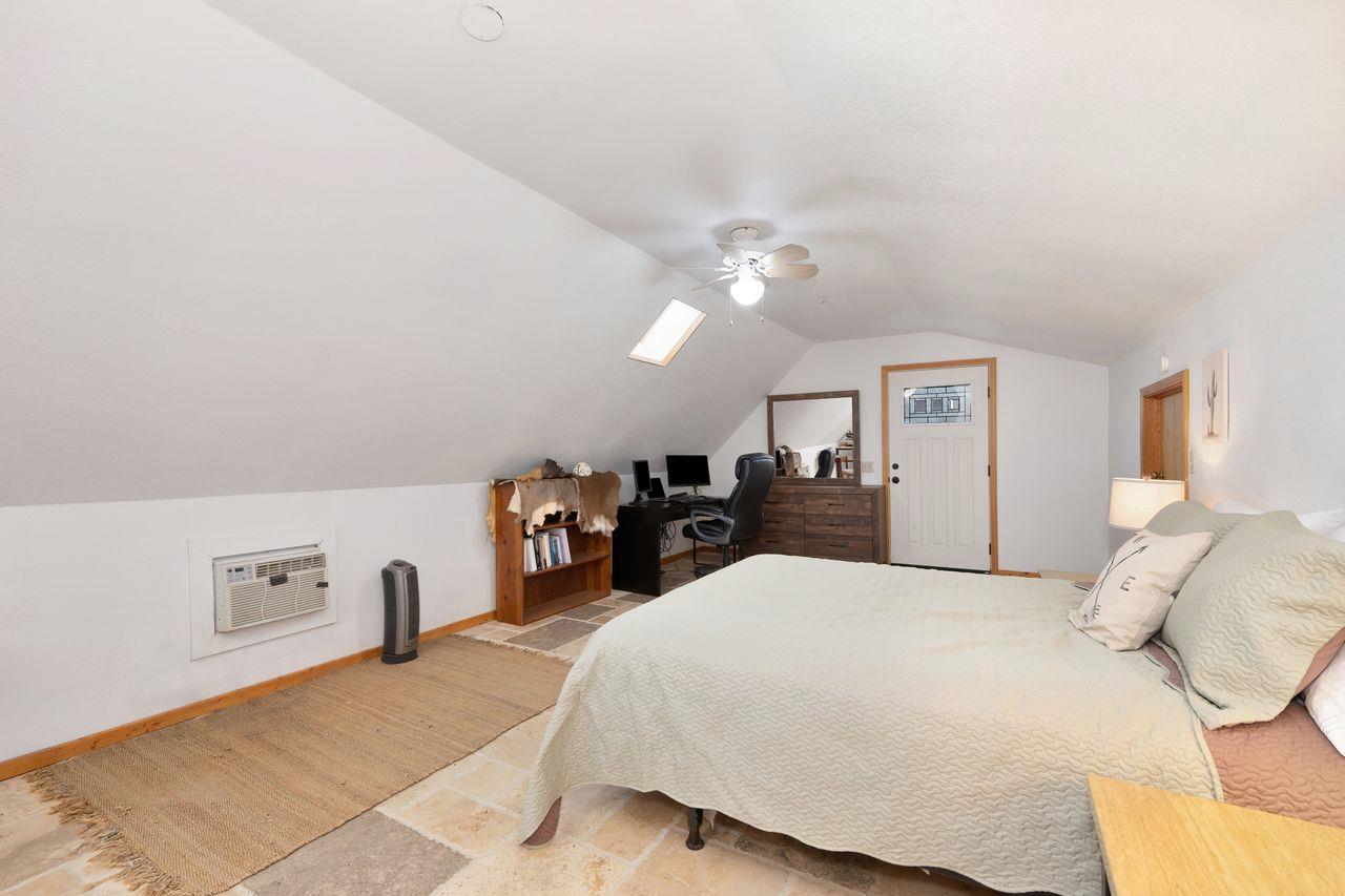 5501 Scott Road Sloughhouse, CA 95683 - Photo 64 of 87 a bed room with a bed mirror and a night stand