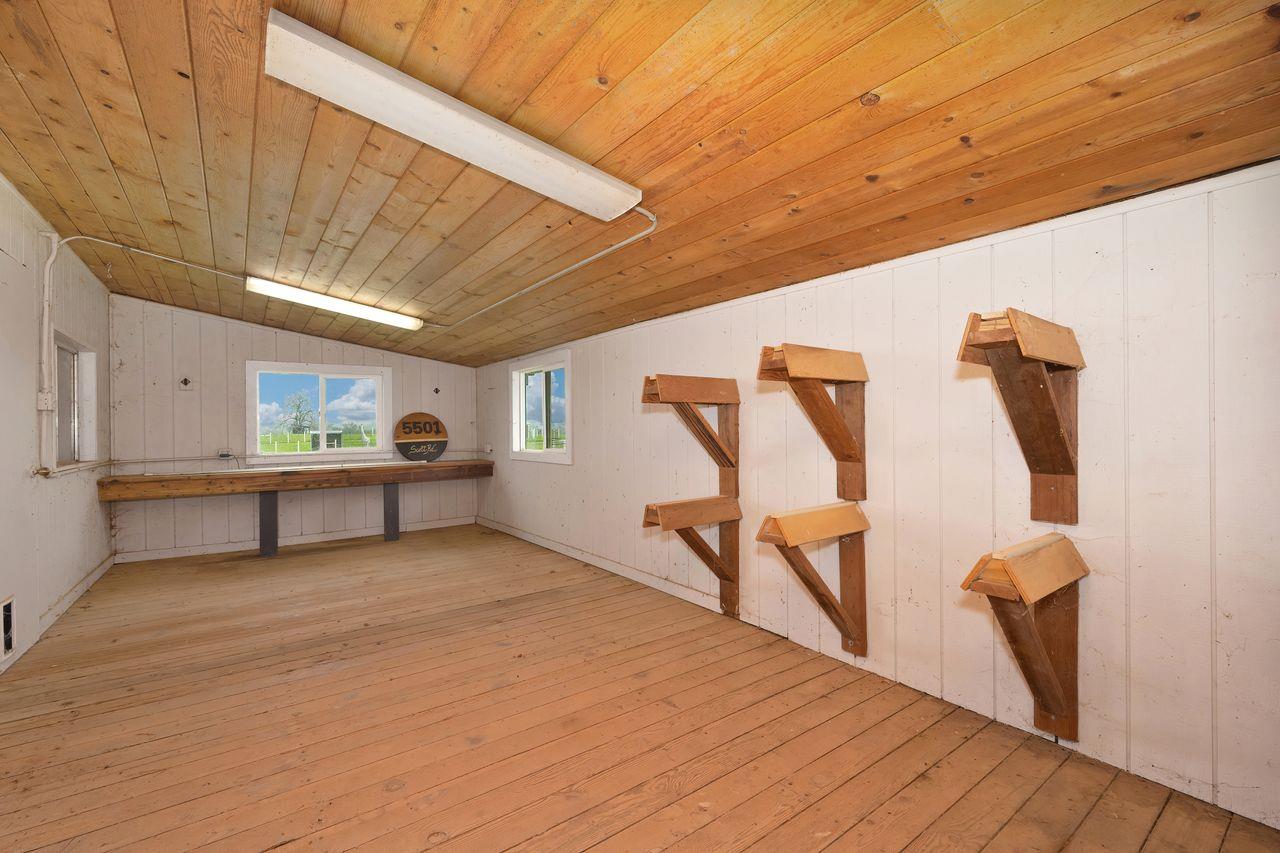 5501 Scott Road Sloughhouse, CA 95683 - Photo 71 of 87 a view of an empty room with wooden floor