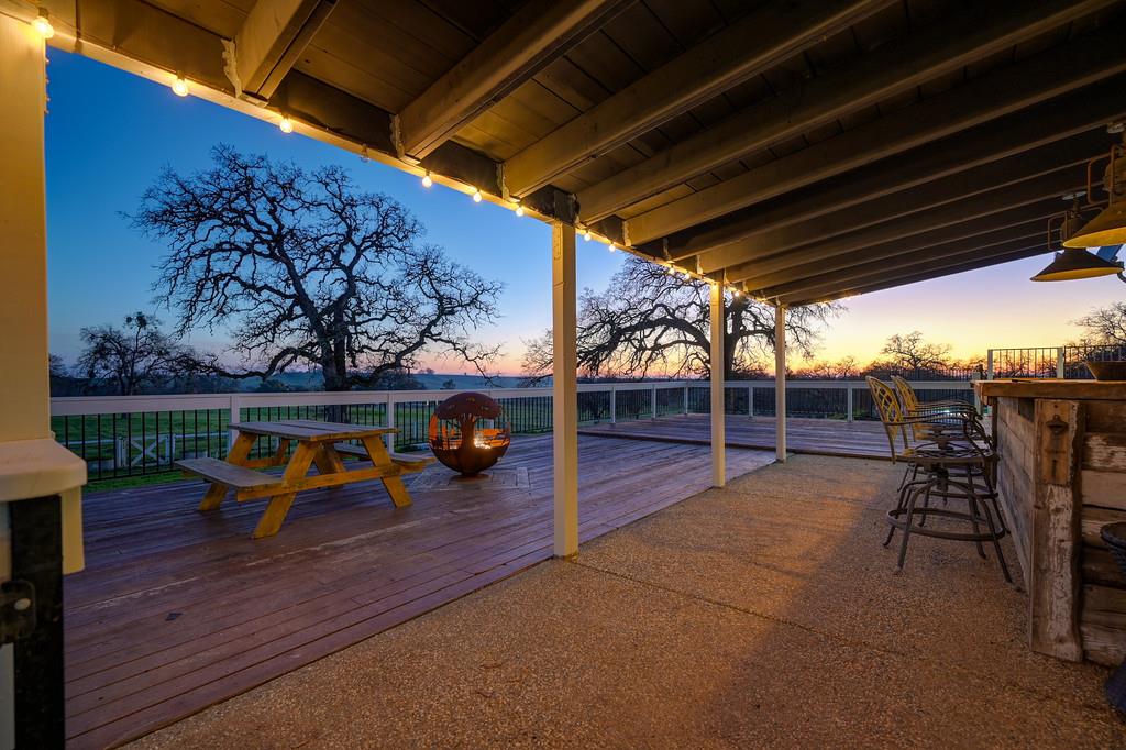 5501 Scott Road Sloughhouse, CA 95683 - Photo 80 of 87 a view of a chairs and table on the wooden roof