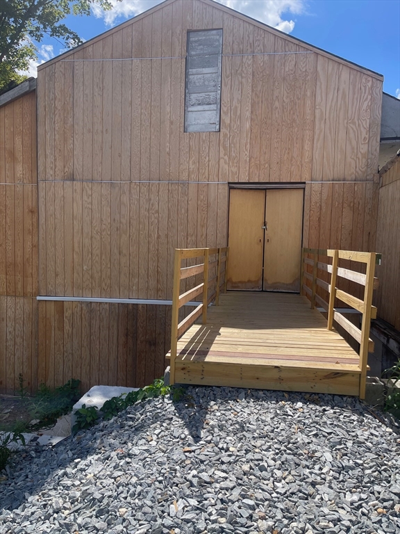 662 Main Street Ashby, MA 01431 - Photo 15 of 20 a view of a pathway gate with wooden fence