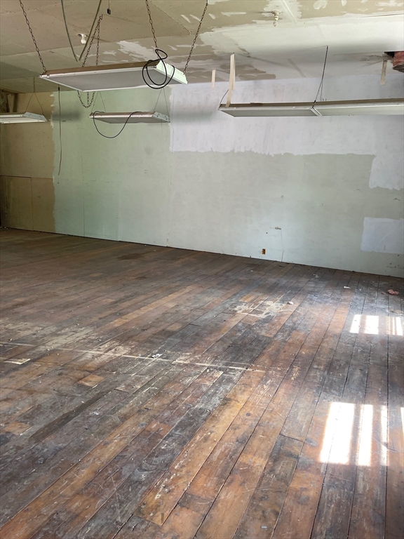 662 Main Street Ashby, MA 01431 - Photo 16 of 20 a view of a room with racks on the wall