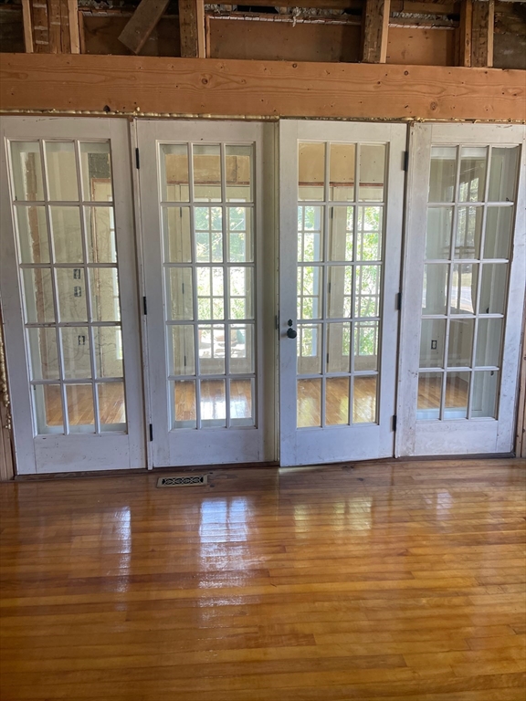 662 Main Street Ashby, MA 01431 - Photo 5 of 20 a view of a room with wooden floor and a window