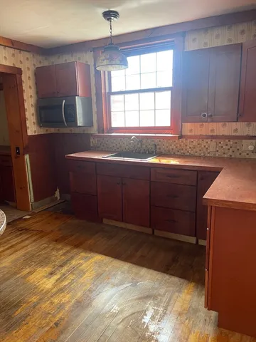 a bathroom with a sink and a bathtub