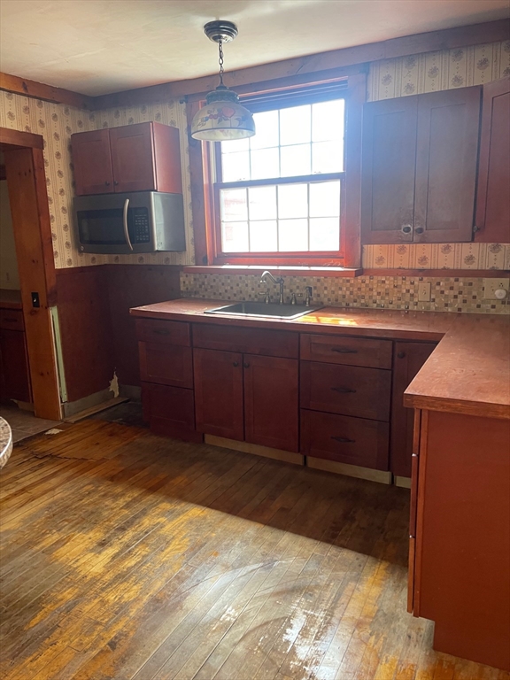 662 Main Street Ashby, MA 01431 - Photo 6 of 20 a bathroom with a sink and a bathtub