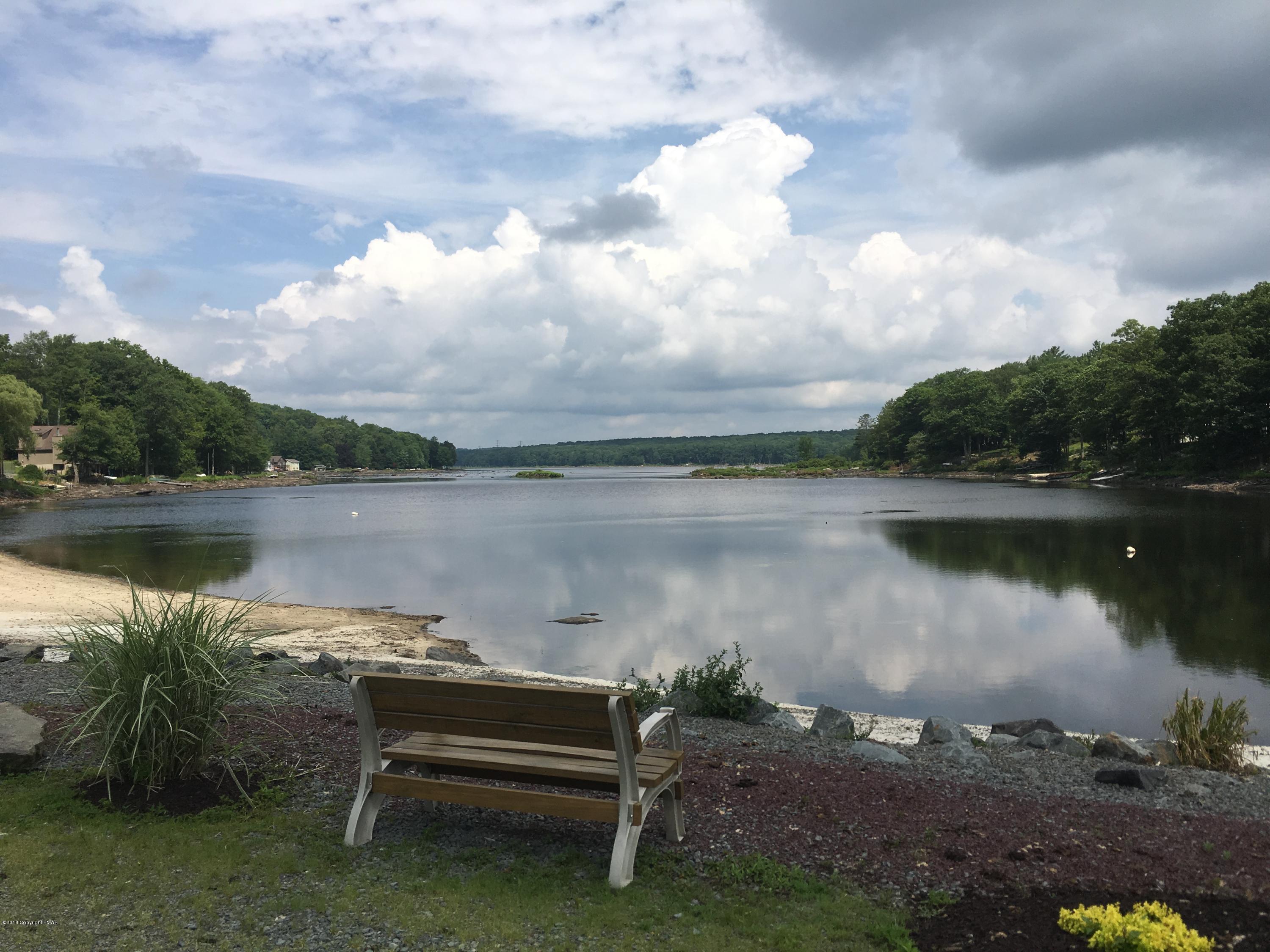 35 Kensington Road Hawley, PA 18428 - Photo 19 of 21 a view of a lake with outdoor seating