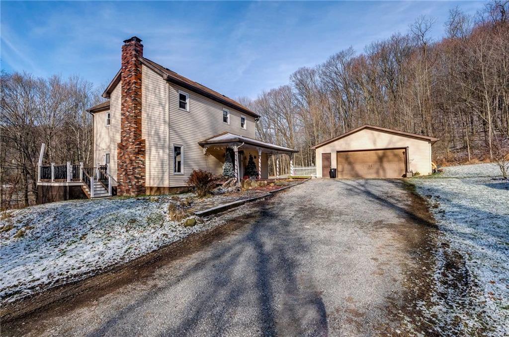 4249 Hollow Road New Castle, PA 16101 - Photo 2 of 33 a front view of a house with a yard