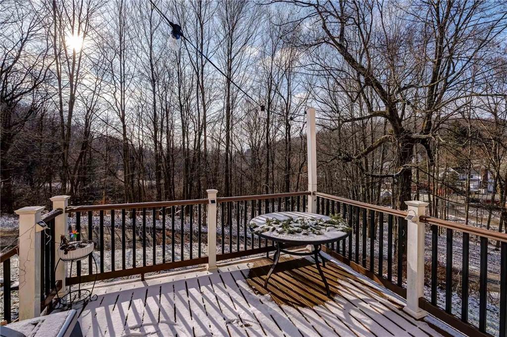4249 Hollow Road New Castle, PA 16101 - Photo 24 of 33 a view of a roof deck with wooden floor and fence