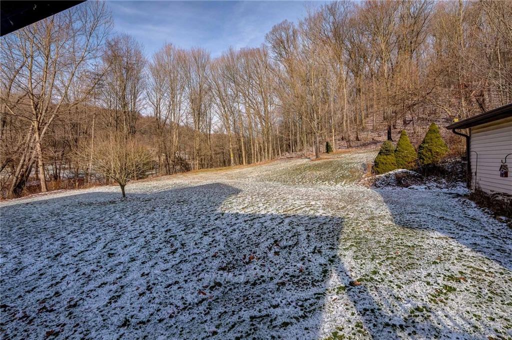4249 Hollow Road New Castle, PA 16101 - Photo 32 of 33 a backyard of a house with lots of green space