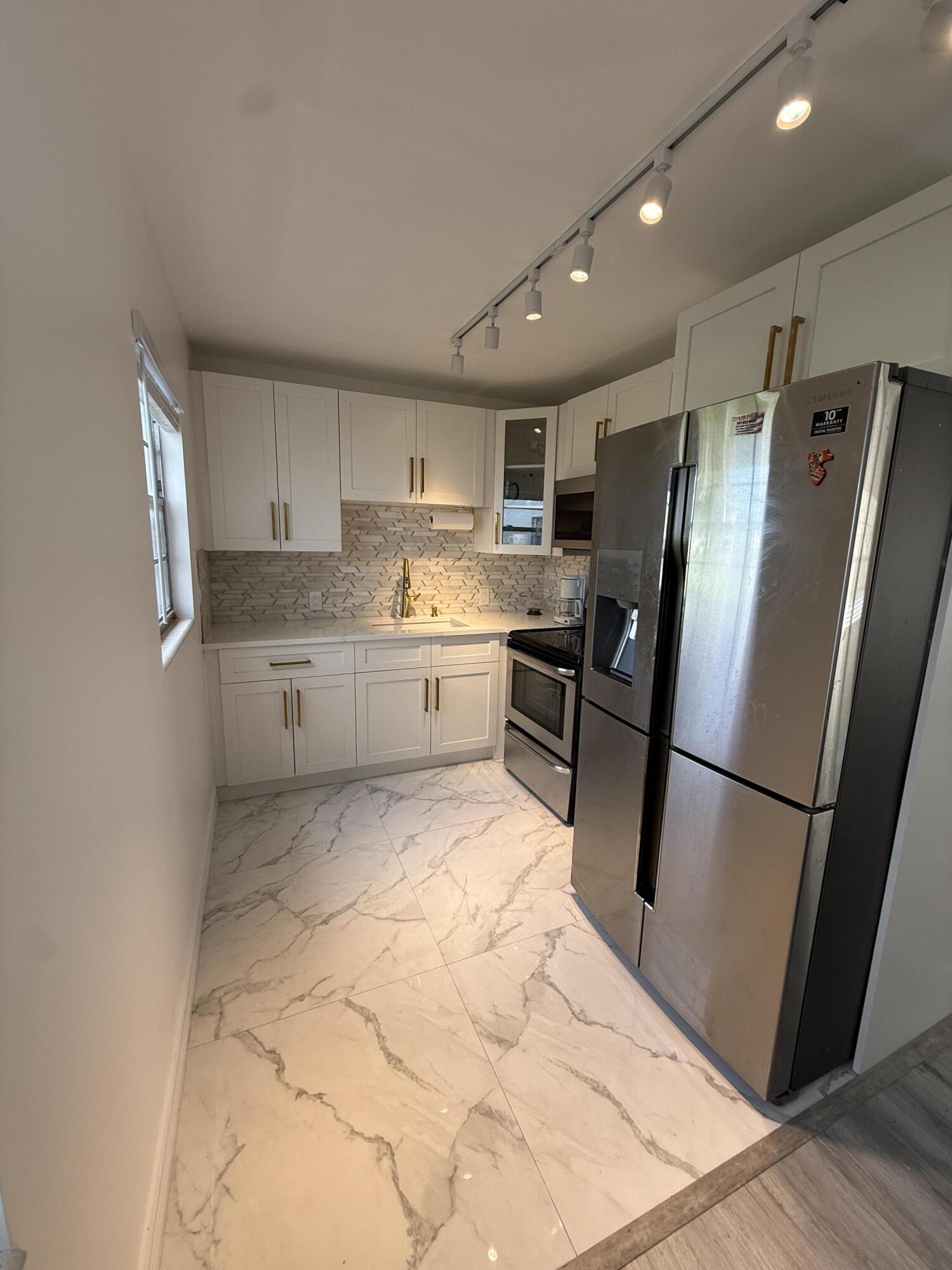 389 Fanshaw Drive, Unit 389 Boca Raton, FL 33434 - Photo 2 of 29 IMG_5634