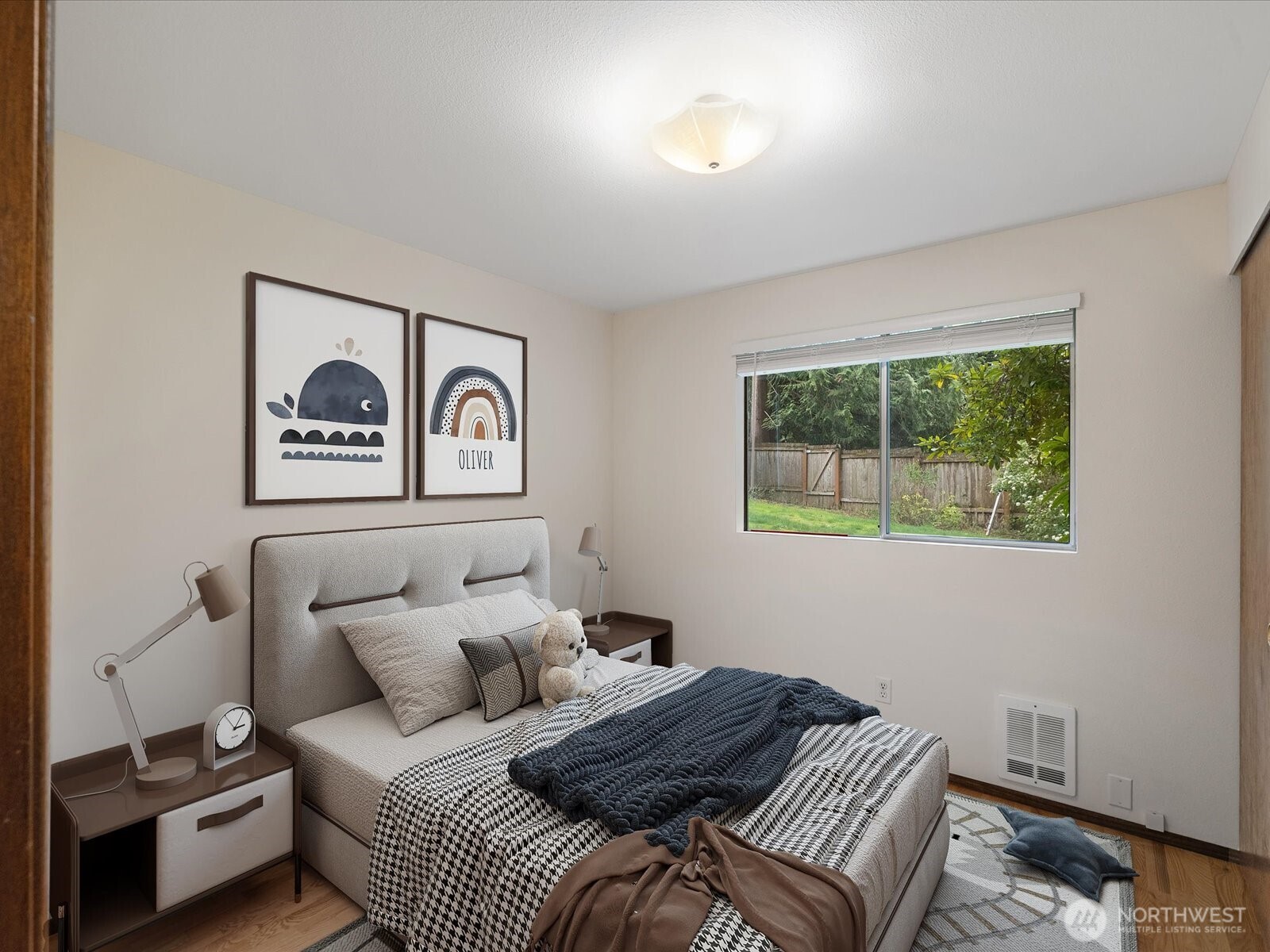 8506 192nd Street Southwest Edmonds, WA 98026 - Photo 29 of 37 a bedroom with a bed and a painting on the wall