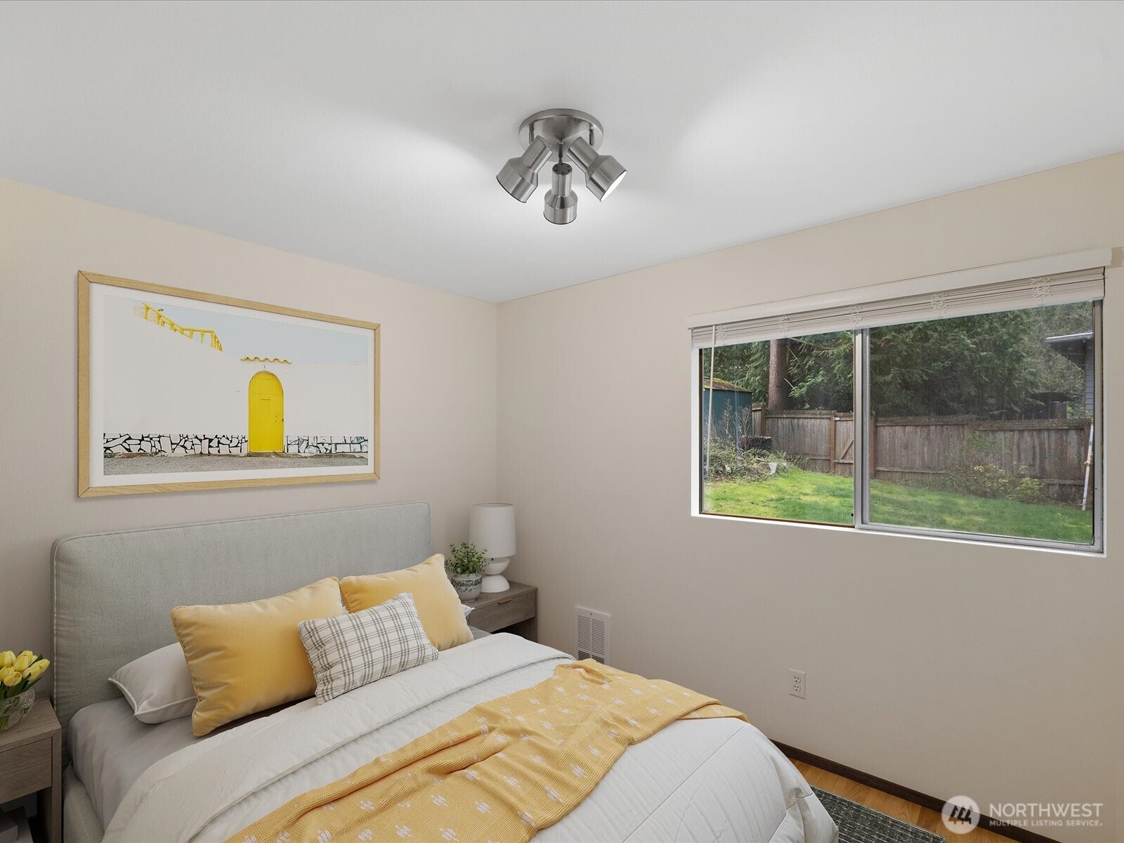 8506 192nd Street Southwest Edmonds, WA 98026 - Photo 31 of 37 a bedroom with a bed and a window