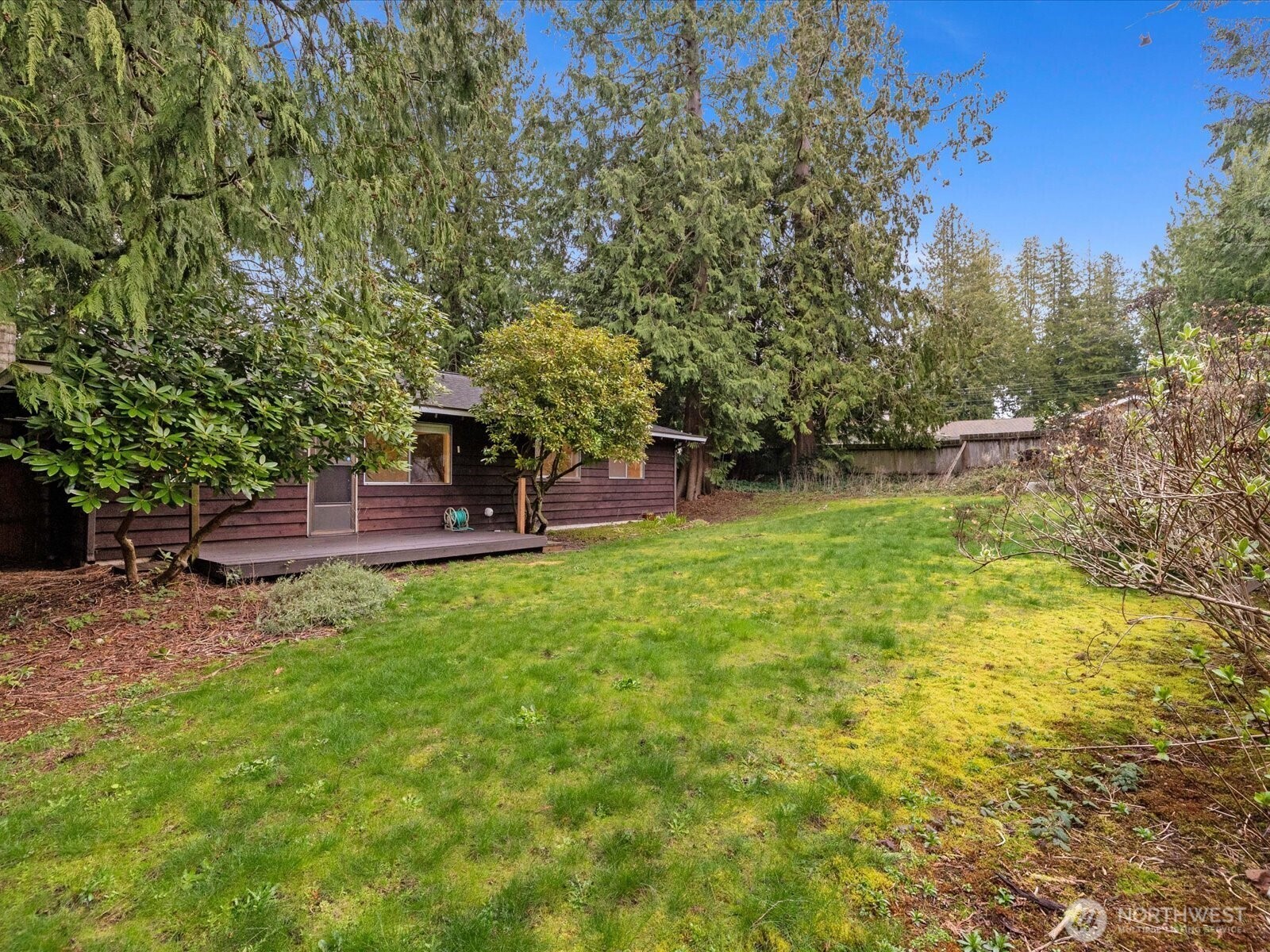 8506 192nd Street Southwest Edmonds, WA 98026 - Photo 32 of 37 a backyard of a house with yard and trampoline
