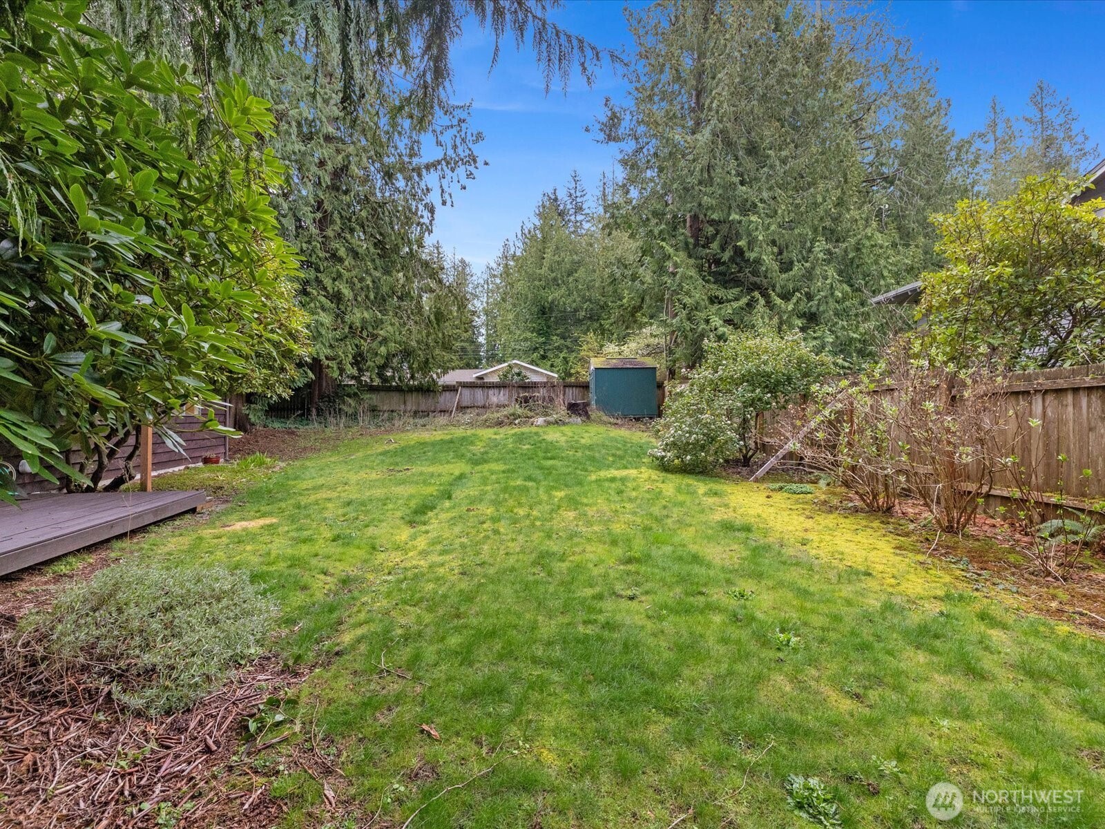 8506 192nd Street Southwest Edmonds, WA 98026 - Photo 33 of 37 a view of a backyard with a small cabin