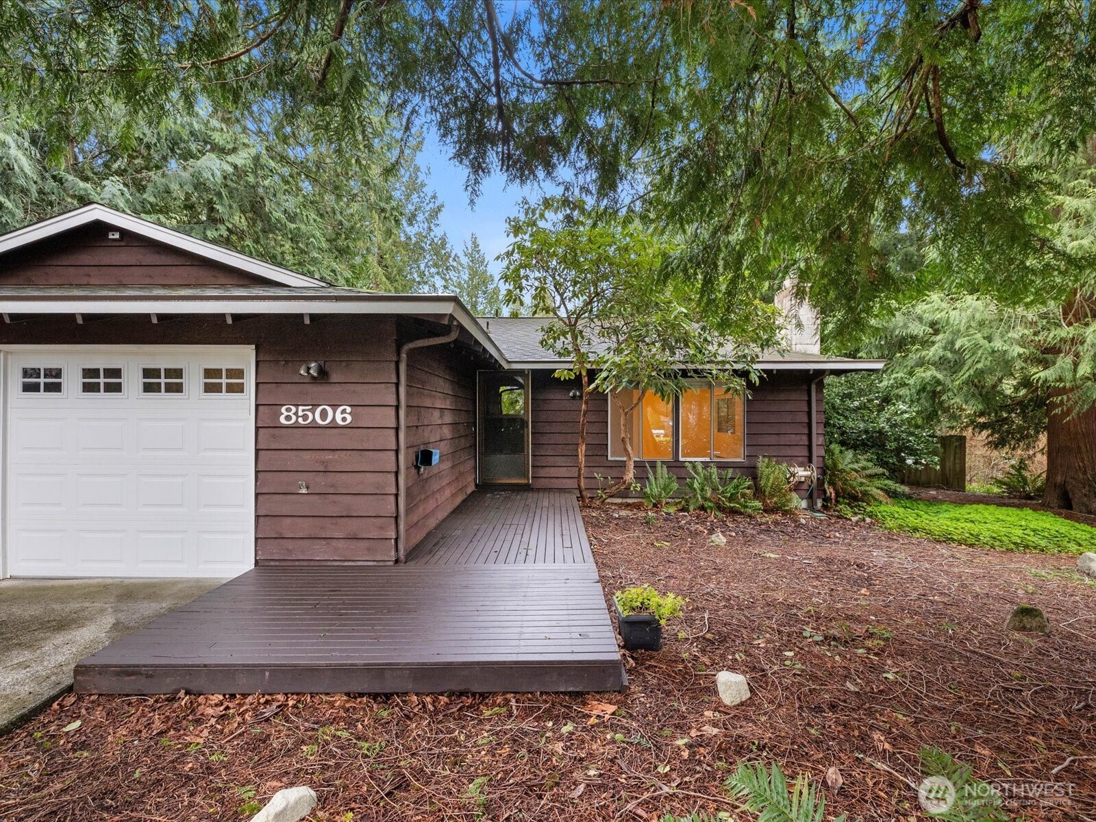 8506 192nd Street Southwest Edmonds, WA 98026 - Photo 4 of 37 a front view of a house with garden