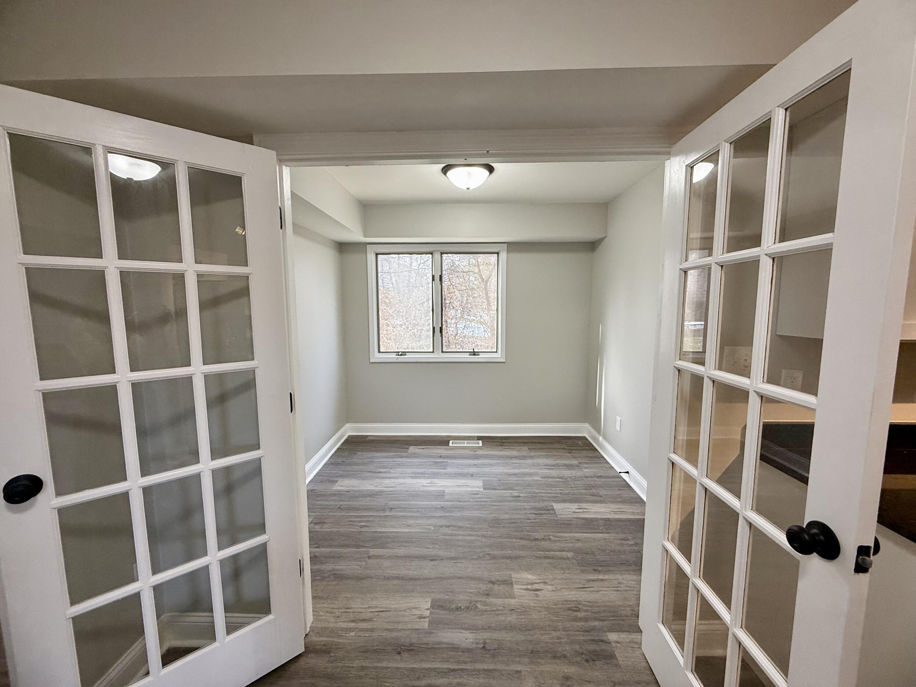 1962 Aspen Court Crown Point, IN 46307 - Photo 11 of 27 a view of an empty room with wooden floor and closet