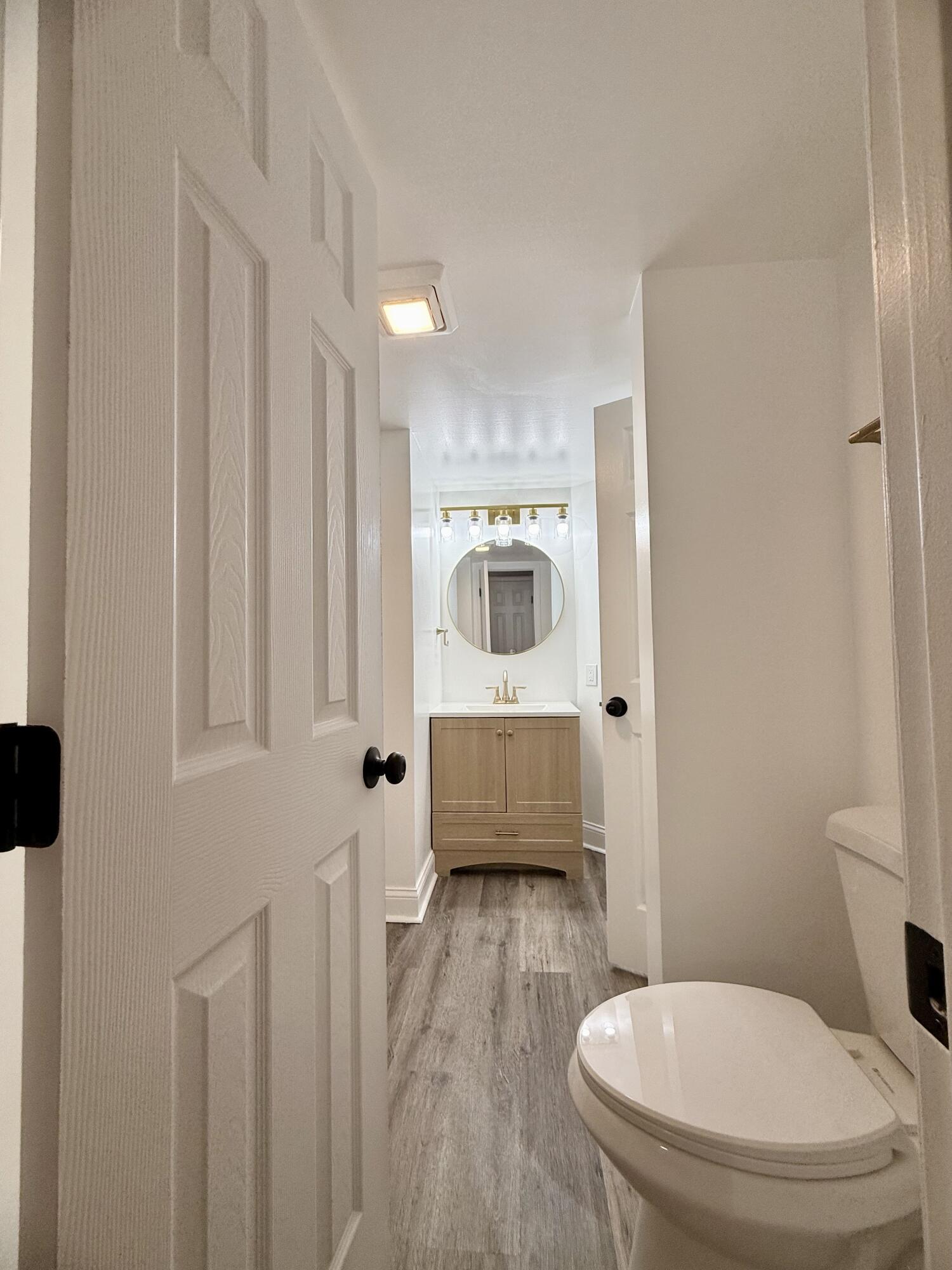 1962 Aspen Court Crown Point, IN 46307 - Photo 15 of 27 a bathroom with a toilet a sink and a bathtub