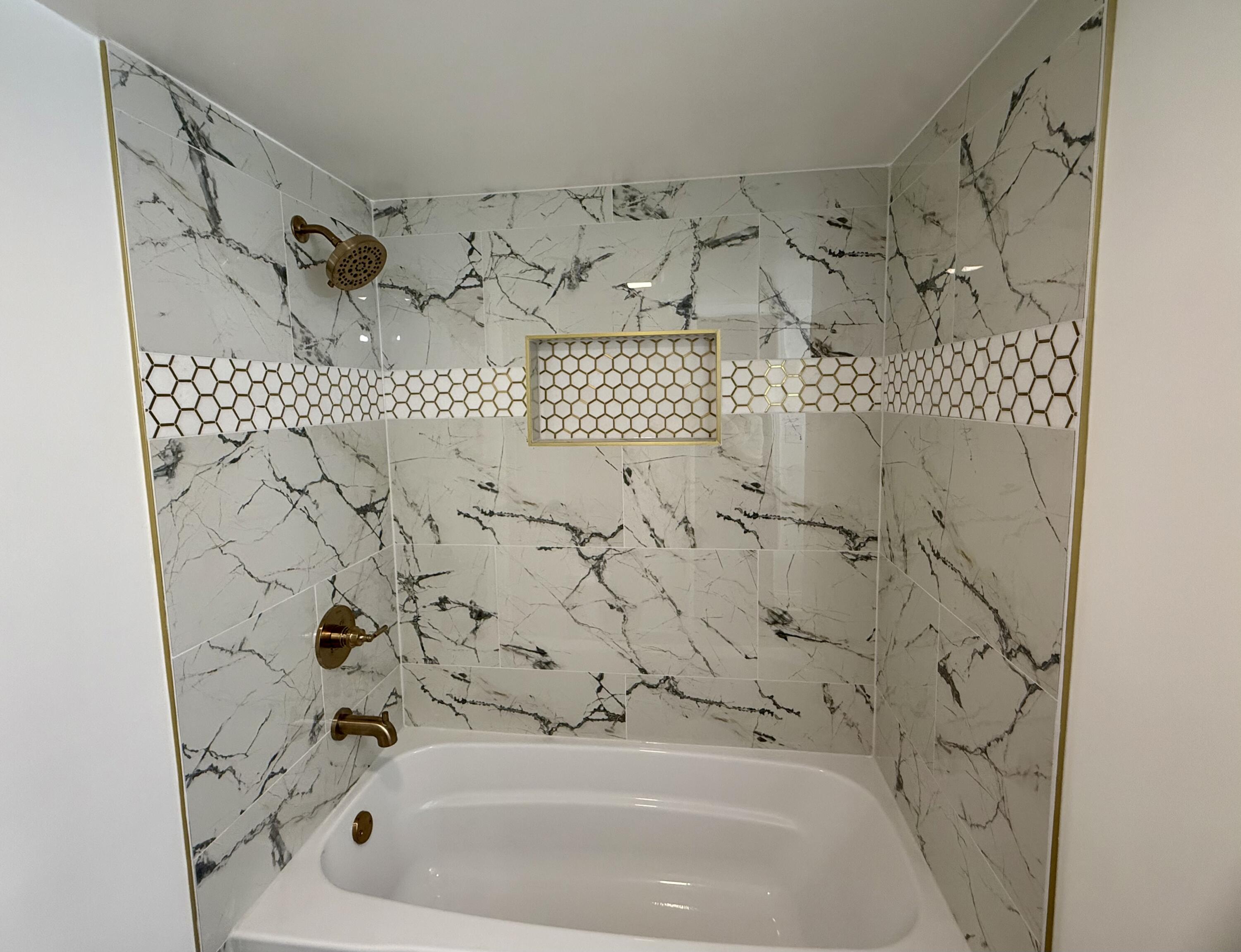 1962 Aspen Court Crown Point, IN 46307 - Photo 17 of 27 a bathroom with a bathtub and shower