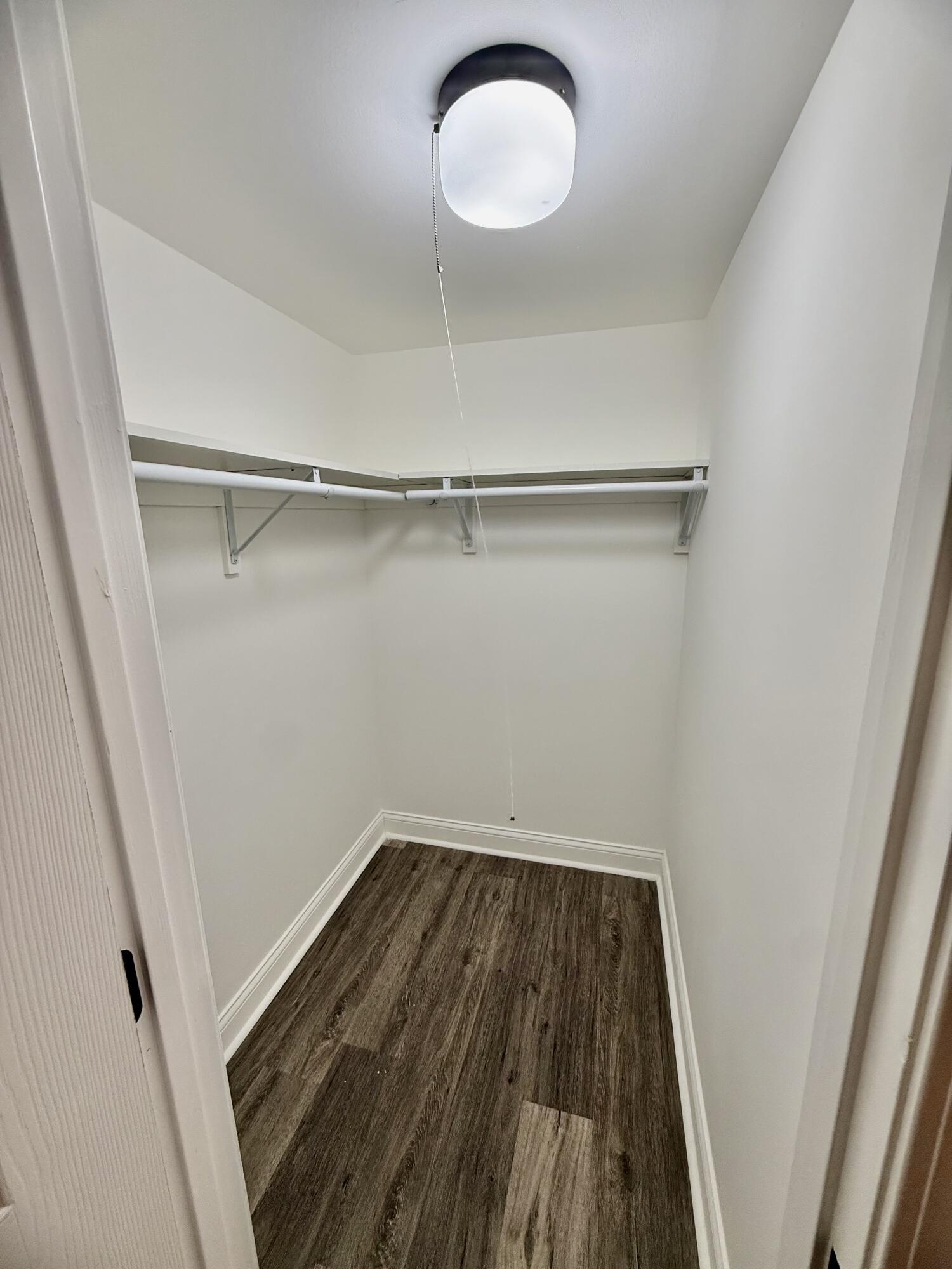 1962 Aspen Court Crown Point, IN 46307 - Photo 18 of 27 a view of a room with wooden floor and white walls